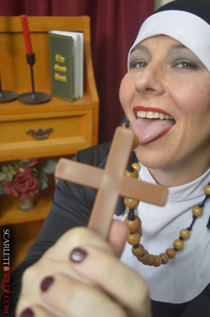 Nun Scarlett seductively licks necklace cross