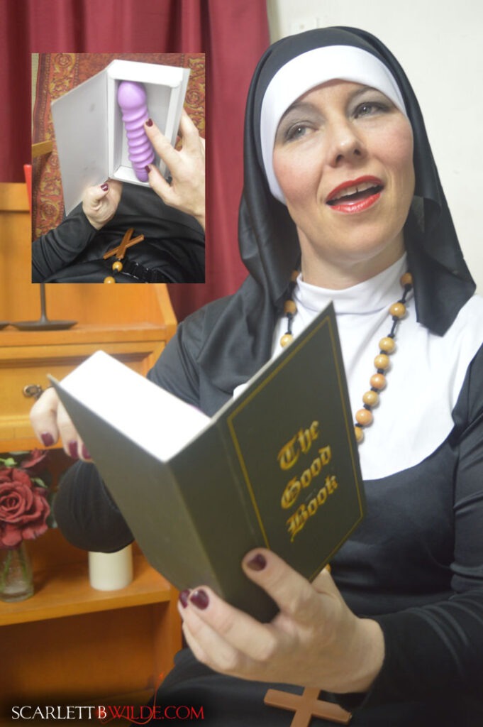 Nun Scarlett looks at bible with sex toy hidden inside